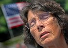 Prayer Day--4 copy  Freida Toney, of Fairforest, closes her eyes as she prays with a group during the National Day of Prayer ceremony held at The Beacon in Spartanburg Thursday afternoon, 5-4-06.